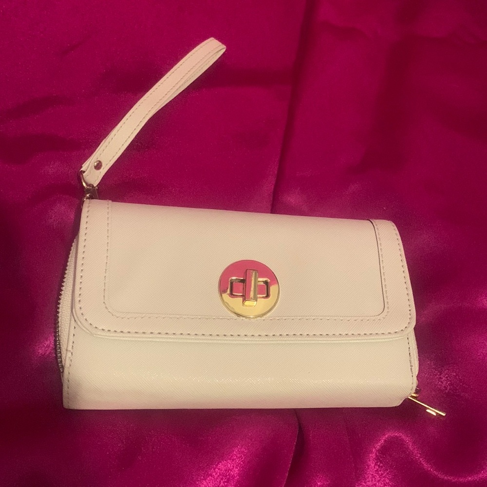 HUGE wallet with one coin comp. and 24 card slots. Wrist strap. 2 sep zip